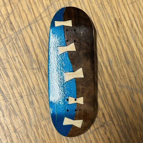 The fingerboard split ply - the,