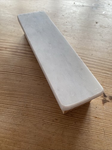 Fingerboard ledge made - made, of